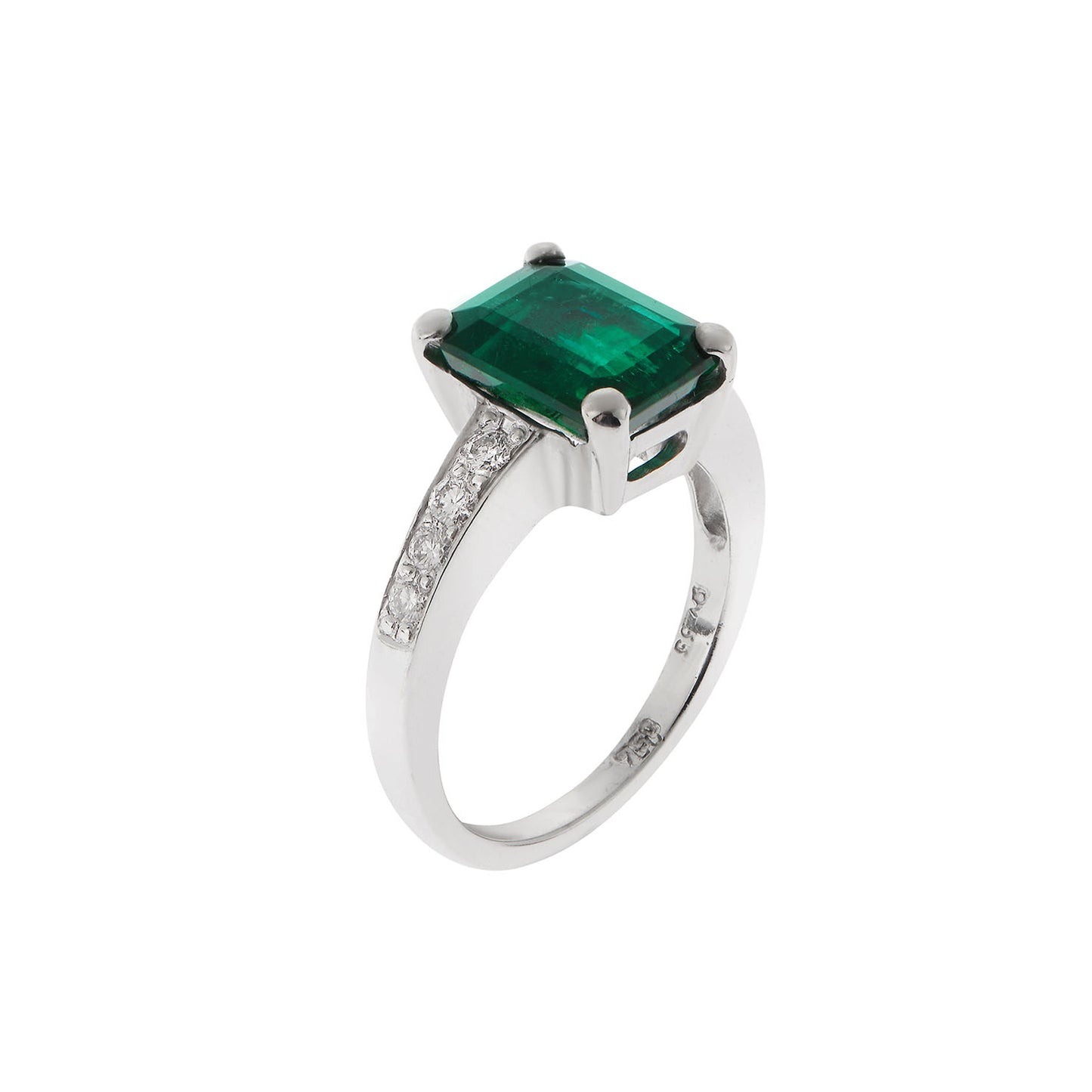 Ring 18KT White Gold with an Emerald cut Emerald and Brilliant cut Diamonds. Product Code : 1163DW057