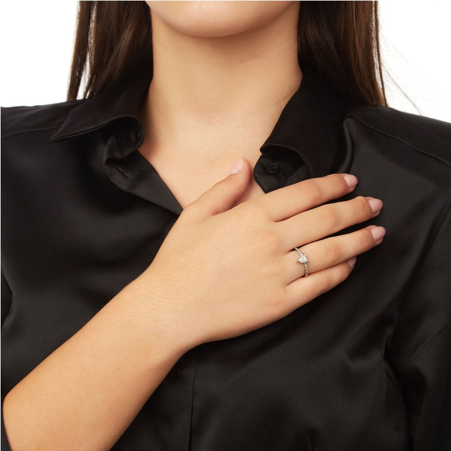 Heart cut diamond solitaire 18KT white gold with Brilliant cut diamonds on the sides. Product Code : 292D1125