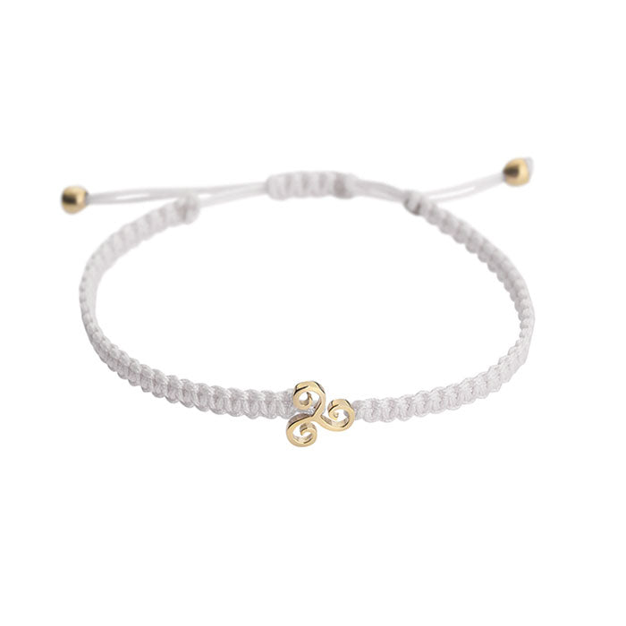 Triskelion 18-carat yellow gold charm bracelet. The Triskelion is a symbol of action, energy and progress. Product Code: 386BY014S