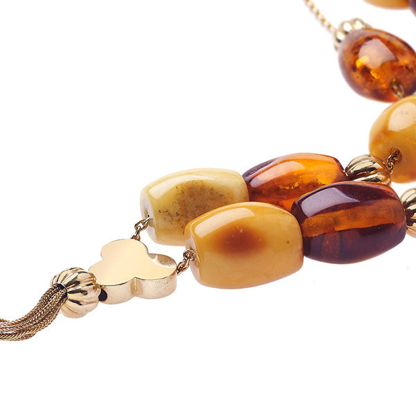 Handmade K14 carat string of beads with amber. Product code:112KK7M