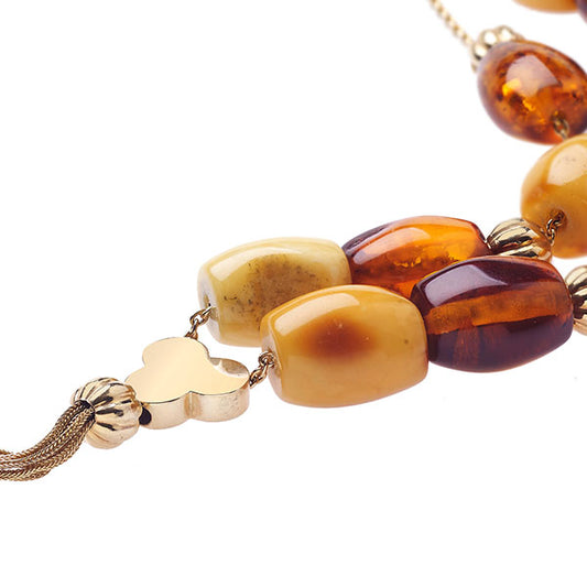 Handmade K14 carat string of beads with amber. Product code:112KK7M