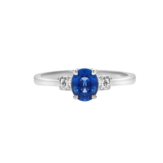 Ring 18KT White Gold with an Oval Sapphire and Brilliant cut Diamonds. Product Code:1402DW493S