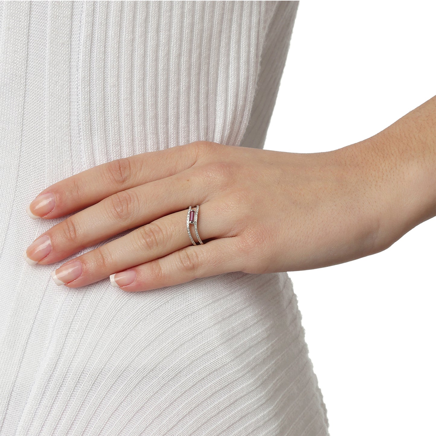 Ring 18KT White Gold with a Baguette Ruby Solitaire and Brilliant cut Diamonds. Product Code : 1120DA44WR