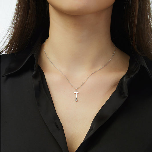 White gold cross 18KT with one brilliant cut diamond.  Product Code: 286ST091.