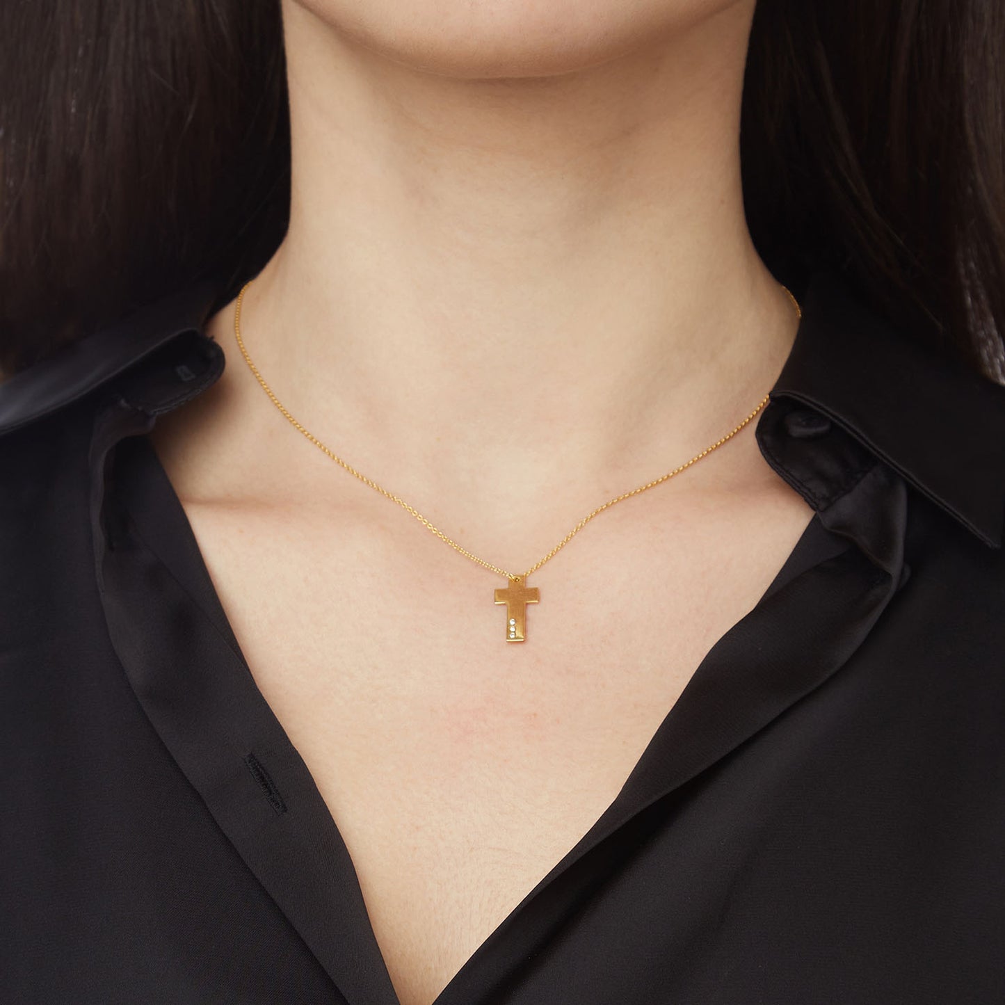 Gold cross 18KT Yellow Gold with three brilliant cut diamonds. Product Code: 339ST01Y.