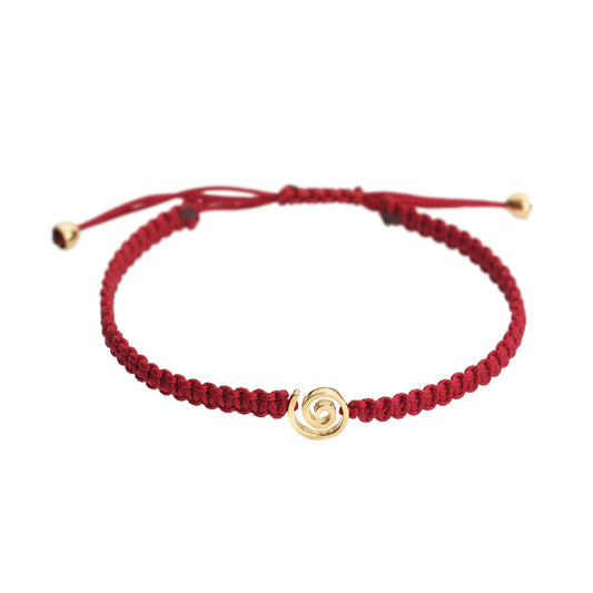 Spiral 18k yellow gold charm bracelet. Spiral is a symbol of energy, growth and  spiritual progress. Product Code: 380BY017S