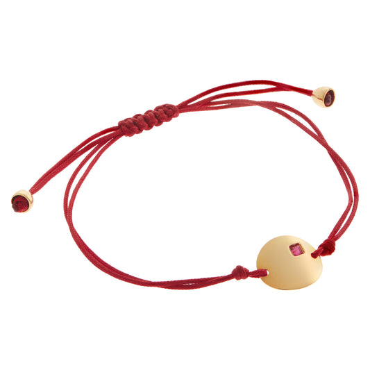 Engravable KT18 Pink Gold and  Ruby Tag Bracelet  attached to a Cord.