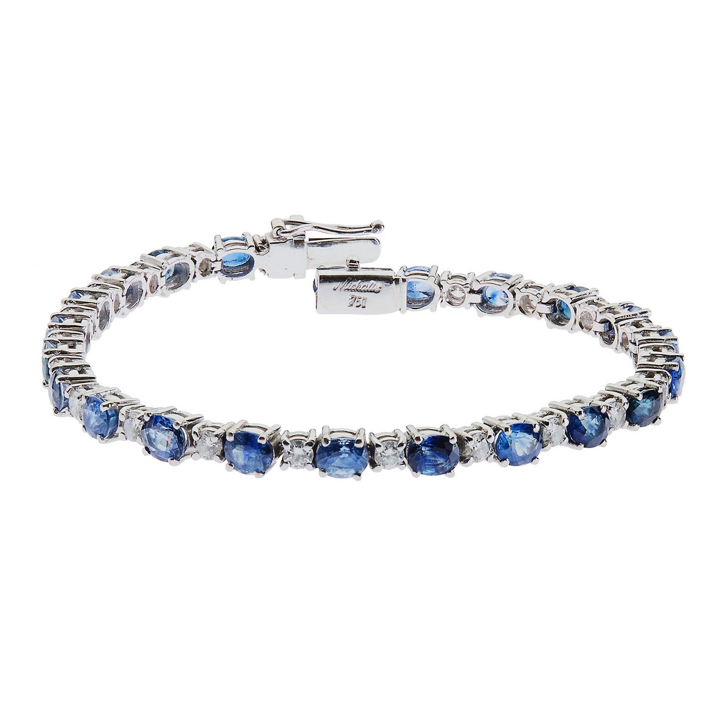 Diamond and sapphire tennis bracelet in 18 carat white gold.   Product Code : 467BA01S