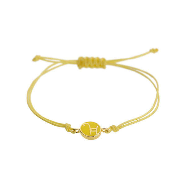 Gemini 18-carat yellow gold, enameled charm bracelet.