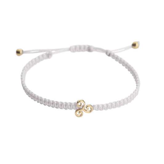 Triskelion 18-carat yellow gold charm bracelet. The Triskelion is a symbol of action, energy and progress. Product Code: 386BY014S
