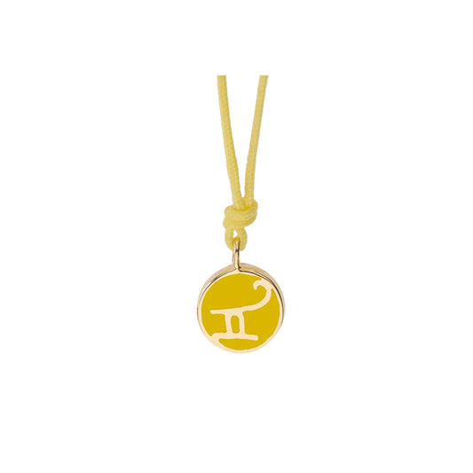 Gemini 18-carat yellow gold, enameled charm.