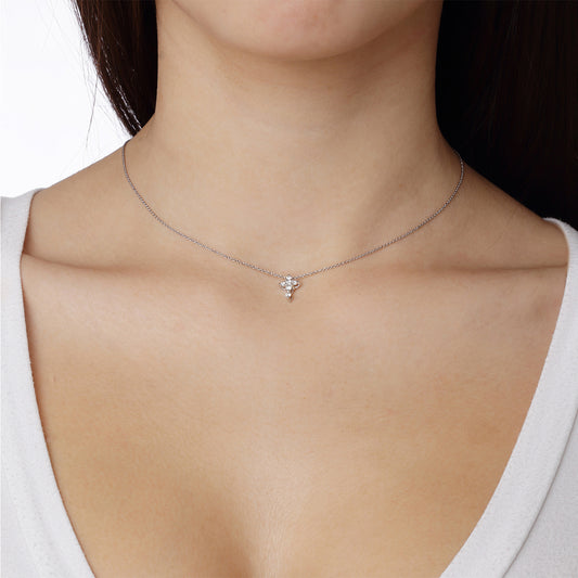 Diamond cross 18KT white gold on a chain. Product Code: 336STMIN01.