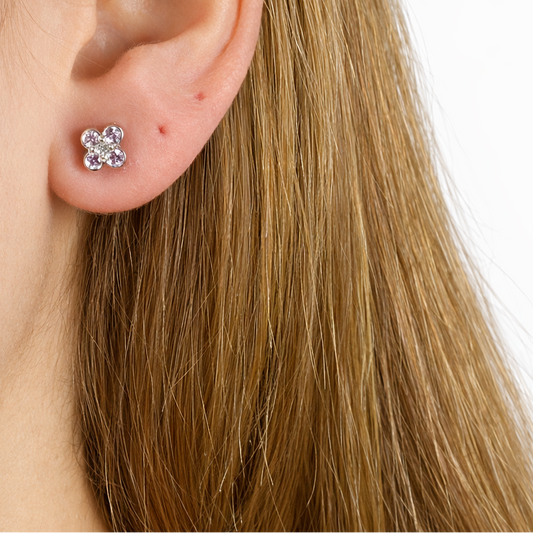 Flower white gold 18K with pink saphires 0,34 carats, diamond 0,07 carat and total weight 2,40. Product Code 607SK055