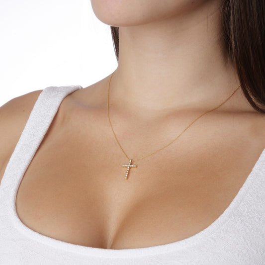 Diamond cross 18KT yellow gold on a chain. Product Code: 296ST092YM.