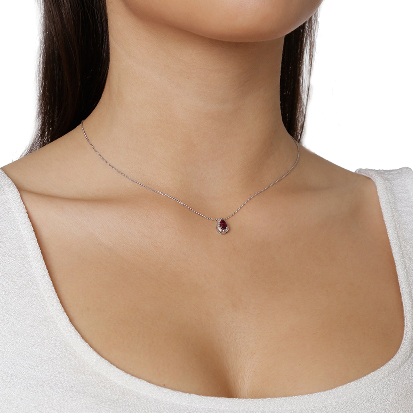Ruby and diamond pendant 18 carat white gold.   Product Code : 534MW35R