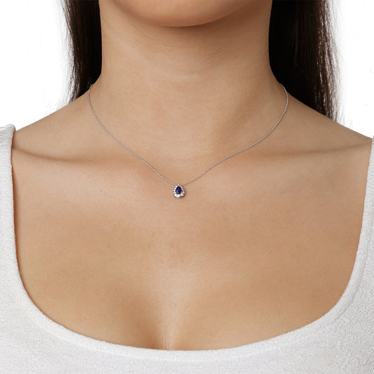 Necklace Pendant 18KT White Gold with a Pear cut Sapphire and Brilliant cut Diamonds.  Product Code : 553MW35S