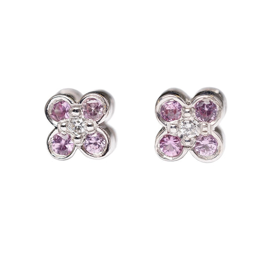 Flower white gold 18K with pink saphires 0,34 carats, diamond 0,07 carat and total weight 2,40. Product Code 607SK055