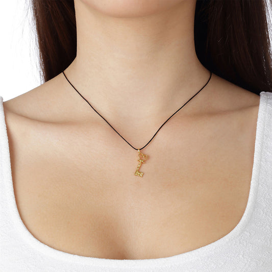 "Key" 18 carat yellow gold charm. Key is a symbol of freedom, liberation, good luck and success. Product code: 445MKLID1