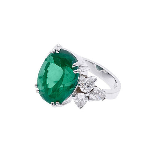 Ring 18KT White Gold with an Oval cut Emerald and Pear cut Diamonds.  Product Code : 1311D113WE