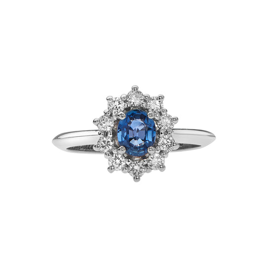 Ring 18KT White Gold with an Oval Sapphire and Brilliant cut Diamonds. Product Code:1420DW69S