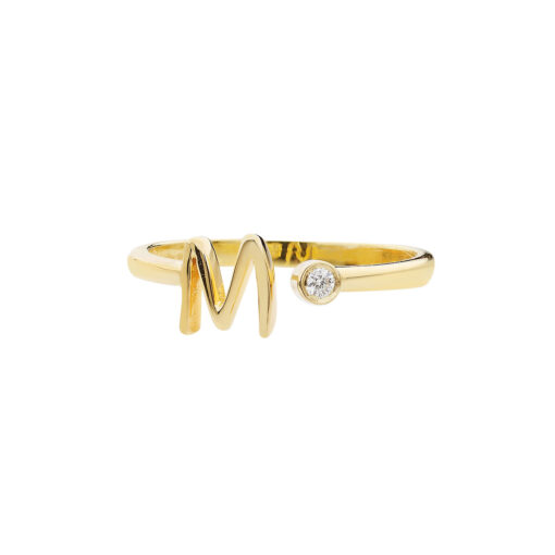 Letter "M" 18 carat yellow gold ring with a diamond.