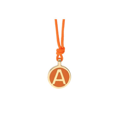 Letter "A", 18 carat yellow gold enamelled charm.