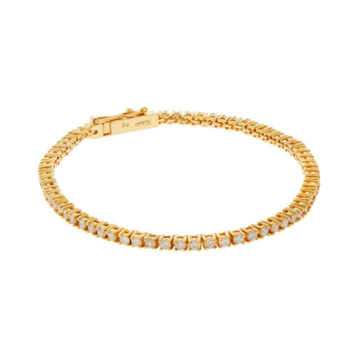 Diamond tennis bracelet in 18 carat yellow gold.
